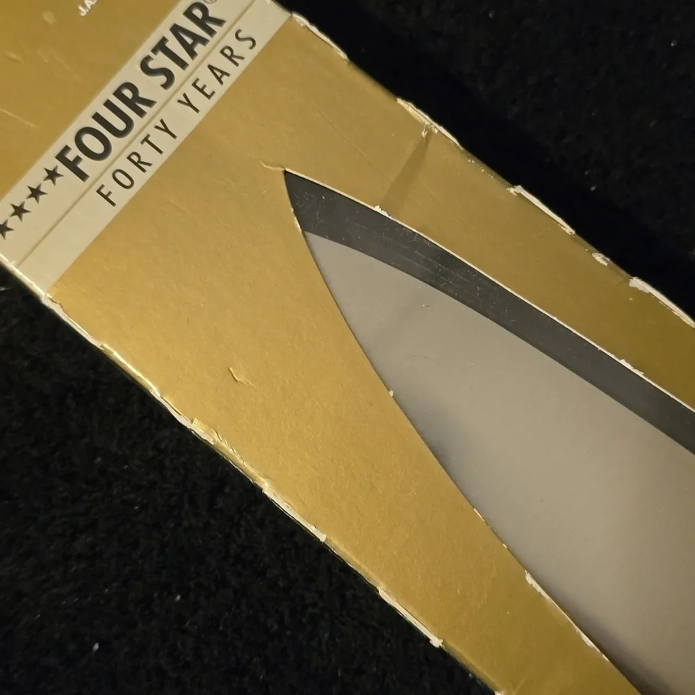 🤎BUY 2 GET 1 FREE  Zwilling Four Star 7 inch Chef's Knife, Retail $129.95